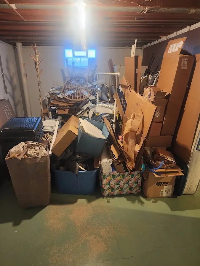 Roll-off dumpster container at job site for 4 Yard Dumpster Rental in Trinity